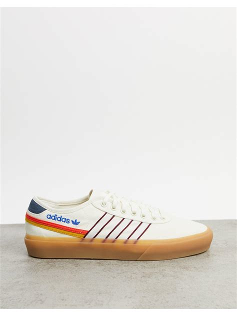 adidas Originals delpala sneakers in white 